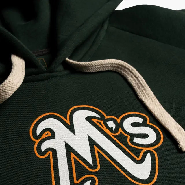 Moakland script print on the green hoodie